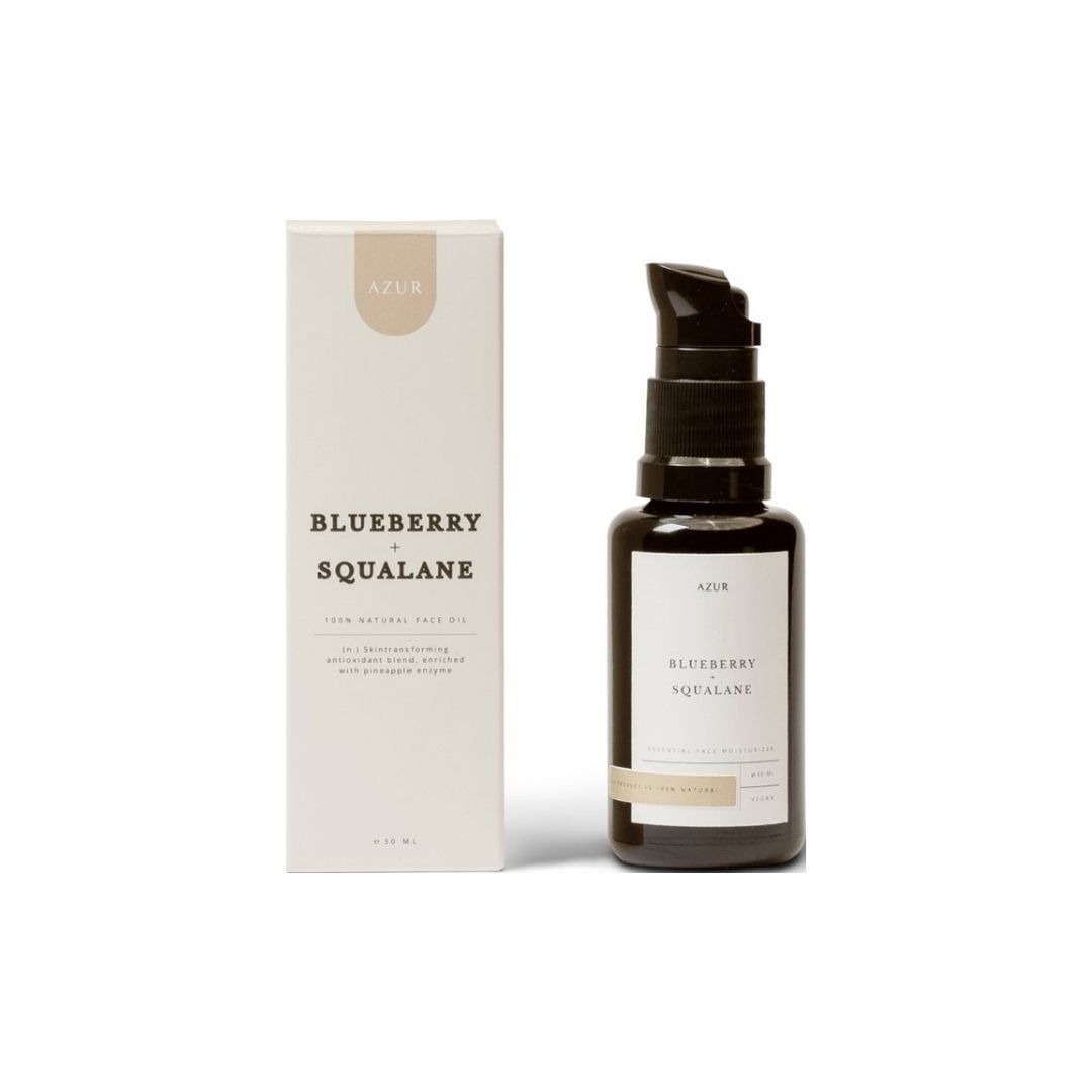 Glazen flesje AZUR Squalane Blueberry Face Oil, een natuurlijke gezichtsolie met squalaan en blauwe bes voor een gezonde en stralende huid.